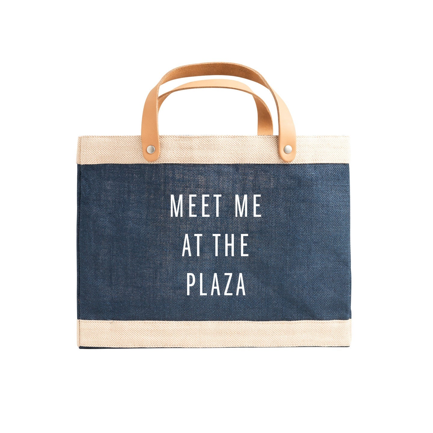 Blue tote bag with 'Meet Me at the Plaza' text on a white background